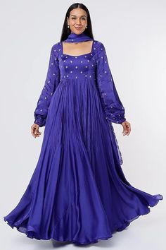 Midnight Blue Satin Organza Anarkali Set Featuring a royal blue anarkali in satin organza with floral butti embroidery. It is paired with a matching viscose organza dupatta. This product will be shipped to you after 1-2 weeks from the date of order placed. All custom made orders are not returnable. {VARIATION MAY COME DEPENDING UPON AVALIBILITY OF LACES OR GOTTA PATI} NOTE: Visual Samples on website may differ slightly from actual product due to light & effects during photography (Length & Bread Semi-stitched Art Silk Gown With Dori Work, Eid Dori Work Semi-stitched Gown, Embroidered Silk Anarkali Set For Party, Blue Semi-stitched Gown For Wedding, Semi-stitched Silk Gown With Dori Work, Floor-length Organza Salwar Kameez For Reception, Floor-length Organza Anarkali Traditional Wear, Floor-length Anarkali Organza Dress, Party Satin Dupatta With Cutdana