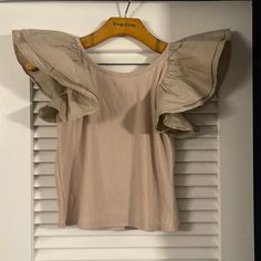 Darling Ruffle Sleeve Crop Tee! Looks Cute With Literally Anything!! Casual Beige Top With Ruffles, Trendy Beige Tops With Ruffles, Trendy Beige Ruffled Tops, Beige Cotton Ruffle Tops, Beige Cotton Tops With Ruffles, Crop Tee, Bucket List, Womens Tops, Crop Tops