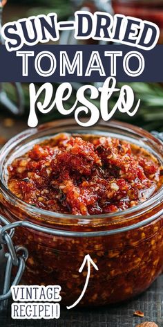 sun dried tomato pesto recipe in a glass jar with the title above it that reads,