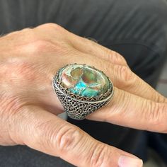 Silver Turquoise Stone Ring, Large Turquoise Rings, Ottoman Style Ring , Natural Gemstone , 925k Sterling Silver Ring , Gift For Him x★Item Details * Gender : Male / Female * Material : 925K Sterling Silver * Total weight : 26 Grams * Gemstone : Turquoise Stone ✔ Ready to Ship in 1-2 Business Days .. ✔ Shipped to the Worldwide 1-5 business days with free shipping... ✔ The product will be sent to you with a handmade wooden box to avoid any damage during shipping... ✔ Visit our store, browse other Silver Turquoise Ring With Inlay, Turquoise Multi-stone Round Opal Ring, Turquoise Inlay Round Rings, Artisan Turquoise Opal Ring, Handmade Turquoise Gemstones For Anniversary, Turquoise Multi-stone Round Gemstones, Turquoise Multi-stone Gemstones, Unique Turquoise Round Gemstones, Unique Turquoise Opal Ring For Anniversary