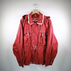 Beautiful blouson in size L from Oil Company. Really nice piece! Basic color red. Has 2 practical side pockets & zipper. Additionally cool chest pockets. Without hood. Without shoulder pads. 100% cotton. You can find more blousons, bomber jackets and other vintage clothes in our Etsy shop. If you have any questions, just write to us! Your soul & style from Berlin P.S.: Our clothes are vintage, so not new. We list defects that go beyond expected signs of wear (e.g. stains, missing buttons, holes, Hooded Cotton Utility Jacket For Streetwear, Casual Streetwear Utility Jacket With Double-lined Hood, Casual Streetwear Utility Jacket With Adjustable Hood, Casual Utility Jacket With Double-lined Hood For Streetwear, Casual Utility Jacket With Adjustable Hood For Streetwear, Utility Cotton Hooded Jacket For Outdoor, Urban Cotton Parka For Streetwear, Urban Style Cotton Parka For Streetwear, Hooded Cotton Utility Jacket For Outdoor Activities