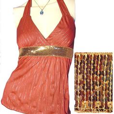 New, Never Used/Washed, Womens Rust-Orange Sleeveless Halter Top/Blouse With Metallic Gold Striped Glitter Accent - Sleeveless Tops. With Gold Glitter Pinstripes/Striped Pattern Details In The Fabric, And Wide Gold Sequin Trim At Waistline. Top Has An Adjustable Back Neck Tie. Made In Usa. Fabric Material Is 100% Polyester. Womens Tops Great As Casual Wear, Summer Tops, Party Tops, Clubwear, Clubbing / Club Tops, Evening Tops, Etc. Hurry! We Have Limited Stocks Left For All Colors! Color: Rust O Orange Sleeveless Halter Top For Party, Orange Stretch Tank Top For Party, Stretch Orange Tank Top For Party, Orange Fitted Top For Party, Orange Sleeveless Tops For Party, Orange Sleeveless Top For Night Out, Chic Fitted Orange Tank Top, Sleeveless Orange Party Tops, Fitted Orange Party Tops