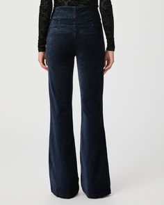 This super flattering pair sits high on the waist, is fitted through the thigh and kicks out at the knee, creating an elongating silhouette. In a deep navy blue shade, this style is made from our ultra-soft, lustrous velvet that is fabricated with plenty of stretch for a comfortable and flattering fit. | High Rise Lou Flare Pant - Deep Navy Velvet | Size 32 Fitted High Rise Wide Leg Pants For Fall, Navy Blue Flare Pants, Deep Navy Blue, Flare Pant, Men Store, Navy Velvet, Denim Shoes, Flare Pants, High Waisted Pants