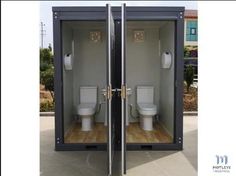 two toilets are open with their lids closed and the doors opened to show what they're doing