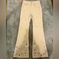 Long Bootcut Corduroy Pants With Super Cute Embroidered Flowers! Soft Material And Would Be Perfect For Any Time! Has Some Stretch And Never Worn. Beige Cotton Pants With Floral Embroidery, Trendy Embroidered Pants For Fall, Embroidered Cotton Bottoms For Fall, Trendy Floral Embroidered Bottoms For Fall, Fall Cotton Pants With Floral Embroidery, Trendy Cotton Pants By Forever 21, Trendy Forever 21 Cotton Pants, Forever 21 Cotton Bottoms For Fall, Forever 21 Wide Leg Pants For Fall