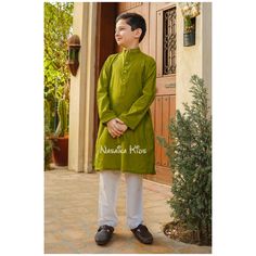 Ready to ship and wear Pakistani boys 2pc shalwar kameez A green cotton chambray kurta with a subtle green embroidered motif gives this style a formal look and is accompanied with white cotton trousers for your handsome lad this festive season. Item details: Top: Green Chambray Cotton Kurta with Embroidery Trouser: White Cotton Trouser Note: Actual product color of the outfit may vary slightly from the image being displayed on your device. More pictures and videos coming soon *Feel free to send Green Dabka Detailed Long Sleeve Sherwani, Green Long Sleeve Sherwani With Dabka, Green Long Sleeve Dabka Sherwani, Green Naqshi Sherwani For Diwali, Green Long Sleeve Traditional Wear For Eid, Green Sherwani With Dabka For Eid, Green Sherwani With Naqshi For Eid, Green Sherwani With Embroidery For Eid, Green Naqshi Sherwani For Eid