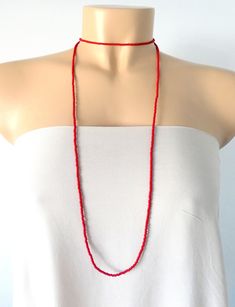 "This is a one strand beaded red necklace, with NO CLASP, and can be worn in multiple ways, as shown in pictures. ❤ SIZES This item is one size fits all. ❤ PROCESSING AND SHIPPING Most orders are made and shipped out in one business day. Please check delivery timeframes for your location on the description below. ❤ CUSTOM ORDERS If you like this item in a different color, send me a message indicating: color, size and quantity needed. I will send you a link for a \"custom order\" and you'll be ab Necklace Layered, Red Necklace, Necklace Long, Seed Bead Necklace, Necklace Dainty, Layered Necklace, Strand Necklace, Bead Necklace, Seed Bead