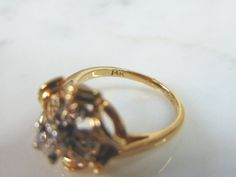 FOR SALE IS THIS WONDERFUL WOMENS 14K YELLOW GOLD RING WITH DIAMONDS. THE RING WEIGHS 4.83g. THE SIZE OF THE RING IS A 5.5. DIAMOND WEIGHT IS .95cts. ANY QUESTIONS PLEASE DO NOT HESITATE TO ASK. BE SURE TO CHECK OUT SOME OF MY OTHER GREAT ITEMS UP FOR SALE. THANK YOU. IF THERE ARE ANY ISSUES PLEASE CONTACT US, WE'RE ALWAYS HAPPY TO TRY TO HELP YOU OUT AS BEST AS WE CAN. 14k Yellow Gold Diamond Ring With Hallmarks, Elegant Yellow Gold Diamond Ring With Hallmarks, Yellow Gold Diamond Ring With Hallmarks For Wedding, Yellow Gold Diamond Ring, Gold Diamond Ring, Gold Diamond Rings, Yellow Gold Ring, Yellow Gold Rings, Gold Ring