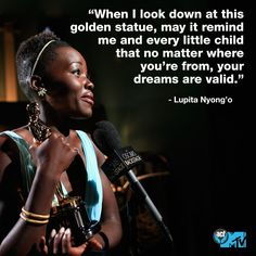 a woman holding a microphone in front of a quote from lupita nyongo