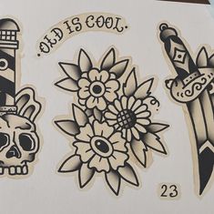 some stickers that are on the side of a piece of paper with flowers and a lighthouse