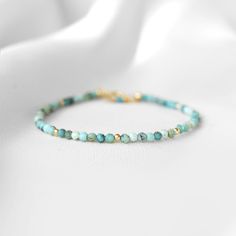 "This hand made bracelet showcases a stunning selection of genuine Turquoise gemstones. This makes a wonderful gift for someone with a December birthday, or any Turquoise lover in your family or friend circle. All jewelry will arrive in an elegant, ready-to-gift drawstring pouch within a gift box. To find your bracelet size, simply measure the circumference of your wrist by wrapping a string around it and measuring the length of the string. If you are shopping for someone else and are unsure of Turquoise Beaded Bracelets, Friend Circle, December Birthstone Jewelry, Stone Bead Jewelry, Main 1, Healing Gemstone Bracelets, December Birthday, Turquoise Bead Bracelet, Wedding Jewelry Bracelets