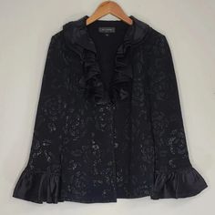 St. John Santana Knit Metallic Floral Print Sweater Jacket Black Ruffle Size 8. Great Condition. Measurements Are Provided In The Pictures. Feel Free To Ask Any Questions. Elegant Long Sleeve Ruffled Cardigan, Fall Evening Blazer With Ruffles, Long Sleeve Blazer With Ruffles For Evening, Elegant Fall Cardigan For Party, Evening Blazer With Ruffles For Fall, Long Sleeve Ruffled Blazer For Evening, Ruffled Long Sleeve Blazer For Evening, Evening Ruffled Blazer For Fall, Elegant Fall Party Cardigan