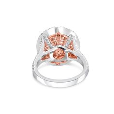 Discover the epitome of luxury with our Rare Sri Lankan Unheated 5.31 Carats Padparadscha Sapphire and Diamond Ring. Crafted with precision and passion, this ring boasts a vibrant Padparadscha Sapphire, known for its rare pink-orange hue. Adorned with sparkling diamonds, experience elegance and exclusivity like never before. Luxury Rose Gold Ruby Ring With Halo Setting, Luxury Ruby Ring With Halo, Luxury Cushion Cut Ruby Ring With Halo Setting, Luxury Ruby Ring With Diamond Halo, Gia Certified Rose Gold Diamond Ring, Luxury Round Diamond Ring With Halo Design, Luxury Round Halo Design Diamond Ring, Luxury Halo Design Round Diamond Ring, Gia Certified Rose Gold Round Cut Diamond Ring