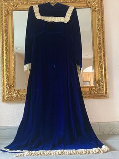 "Blue velvet Victorian style dress with lace detail. Union made in USA- dry, clean only.  Excellent vintage condition yet does have some frayed lace that you will see in the picture on the hem and a slight flaw on the front of the dress fabric-  see pictures for details.   Size Small  Measurements laying flat: 14\" across waist  15\" shoulders  23.5\" sleeves  42\" length waist to hem" Victorian Fashion Dresses, Blue Velvet Dress, Union Made, Dress With Lace, Victorian Style, Blue Velvet, Velvet Dress, Dress Clothes For Women, Victorian Fashion