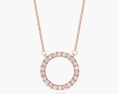 14K Rose Gold Open Circle Diamond Necklace. Slim and sparkling, this classic diamond circle pendant is a touching look she'll want to wear every day. Crafted in 14K gold, this petite style features round brilliant-cut diamonds along the facing edge. This pendant suspends along an 18.0-inch cable chain with an extra jump ring at 16 inches for versatility and secures with a lobster clasp. Open Circle Pendant Necklace, Circle Diamond Necklace, Diamond Circle Necklace, Diamond Circle Pendant, Petite Style, Circle Diamond, Rose Gold Diamonds, Circle Pendant, Petite Fashion