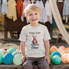 Personalised Children's Easter T-shirt   Gorgeous t-shirt featuring a cute Easter themed digger image, this would make a lovely gift for Easter. Can be personalised with any name. Poly cotton blend Short sleeve Supersoft feel Design printed directly onto the garment, no transfers or vinyl Machine washable and will retain shape Available in sizes: 6 - 12 months 1 - 2 years 2 - 3 years 3 - 4 years 4 - 5 years 5 - 6 years Please see image for sizing. **Shipping** All orders will be despatched within 2 - 3 working days. Check out the rest of my product range here https://www.etsy.com/uk/shop/IndigoPig Playful Easter Short Sleeve T-shirt, Cute Short Sleeve Easter T-shirt, Playful Short Sleeve Tops For Easter, Playful Easter Tops With Graphic Print, Easter Graphic Print Playful Tops, Cute Easter T-shirt With Crew Neck, Playful Short Sleeve T-shirt For Easter, Cute Easter Crew Neck T-shirt, Playful Easter T-shirt With Short Sleeves