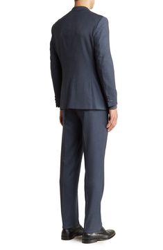 A refined two-button suit cut in a trim silhouette is the perfect go-to for any well-dressed event. 36.4" inseam; 7.8" leg opening; 10.6" rise (size 36) Jacket has notched lapels; chest welt pocket; dual flap welt pockets
 Lined 73% polyester, 25% rayon, 2% spandex
 Dry clean
 Imported Model stats: 6'1" height, 32" waist. Model is wearing size 36. Semi-formal Notch Lapel Pantsuit With Button Closure, Blue Notch Lapel Tuxedo For Work, Blue Double Breasted Single Button Suit For Formal Occasions, Blue Three-piece Suit With Welt Pockets For Work, Single Button Notch Lapel Suits For Office Wear, Blue Suits With Notch Lapel And Hidden Button Closure, Tailored Single Button Pantsuit With Notch Lapel, Blue Single-button Suit For Work, Fitted Blue Double Breasted Suit For Office