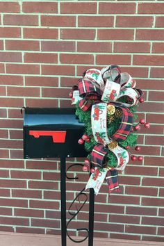 a mailbox with a christmas wreath on it