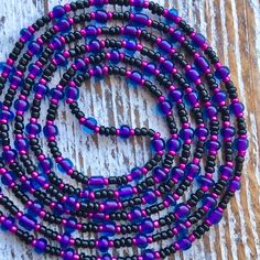 Ursula Waist Bead Strand Beautiful Waist Beads * Colors: Purple, Pink, Black,  * Medium Glass seed beads * 45 Inch Tie On Waist Beads * 100% Cotton Thread * Fits Up To 45 Inches With 12 Inches Of Extra String For Tie On ( If you are needing a larger size message me and I will do my best to meet your needs) * Handmade By Distant Reflections * Can Also Be Wrapped To Be Worn As An Anklet or Bracelet * I Also Do Custom Orders, If There Are Certain Colors You Are Wanting Just Message Me And I'll Do M Pink And Black Waist Beads, Waist Beads Purple, Spiritual Multicolor Round Waist Beads, Multicolor Polished Waist Beads, Adjustable Hand-strung Spiritual Waist Beads, Belly Beads, Beads Colors, Tools For Women, Colors Purple