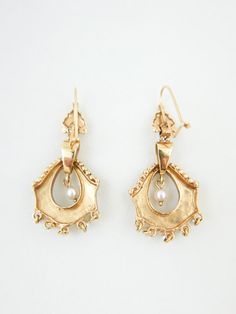 Delicate pearl & gold dangling mini chandelier earrings from around 1920/30’s. 1.5”(h) x 0.75”(w)Marks: 14K Condition: Excellent Antique Pearl Drop Earrings For Formal Occasions, Victorian Teardrop Pearl Drop Earrings, Antique Drop Pearl Earrings For Formal Occasions, Antique Formal Dangle Chandelier Earrings, Antique Dangle Chandelier Earrings For Formal Occasions, Victorian Style Drop Pearl Earrings, Victorian Chandelier Earrings For Evening, Antique Chandelier Earrings For Formal Occasions, Victorian Chandelier Dangle Earrings For Formal Occasions