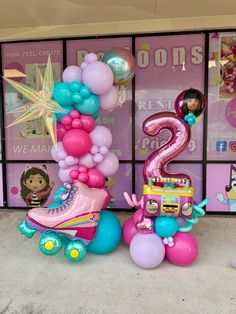 a number two balloon sculpture with roller skates and balloons