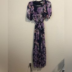 Gorgeous Light And Flowy Floral Maxi Dress By Shelby And Palmer. Never Worn. Size 8. Tie Waist, Back Zipper. Bundle From My Closet And Save On Shipping!! Casual Purple Floral Print Maxi Dress, Purple Floral Print Midi Dress For Beach, Purple Floral Dress For Party, Purple Floral Print Midi Dress For Vacation, Purple Floral Midi Dress For Vacation, Vacation Purple Floral Print Midi Dress, Flowy Lavender Maxi Dress With Floral Print, Spring Purple Floral Midi Dress, Purple Short Sleeve Maxi Dress