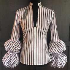 New With Tags This Is Such A Fun Top! Red White & Blue Striped With A V Neckline & Puffed Sleeves. Pair This Up With A Pair Of Skinny Jeans& Red Heels You Will Be Ready For A Night Out On The Town. Has A Side Zipper (Shown In Pics) Pit To Pit 17” Shoulder To Hem 24” Sleeves 24-26” Try My Bundle Discount & Save!! 3 Or More Items 10% Off No Lowballers Plz Trendy Striped Puff Sleeve Top, Striped Long Sleeve Party Top, Striped Long Sleeve Party Blouse, Striped Tops For Fall Party, Fitted Striped Blouse With Ruffles, Spring Party Striped Blouse, Trendy Fitted Striped Blouse, Striped Blouse With Puff Sleeves, Blue Fitted Top With Balloon Sleeves