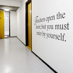 an open door is on the wall next to a sign that says teachers open the door but you must enter by yourself