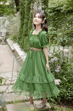 Leafy green midi dress with a ruffled square neckline, short puff sleeves and tiered midi skirt with lace trims. Matching belt included to snatch that waist. S: 36" chest, 27" waist, 43.5" lengthM: 37.5" chest, 28.5" waist, 43.5" lengthL: 39" chest, 30" waist, 44" lengthXL: 40.5" chest, 31.5" waist, 44" length Midi Dress Green, Tiered Midi Skirt, Skirt With Lace, Lace Trims, Forest Fairy, Green Midi Dress, Shoe Gifts, Lace Midi, Lace Midi Dress