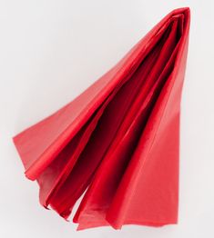 red folded paper on white background