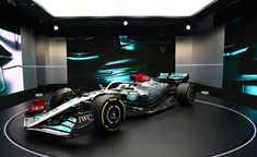 the new mercedes formula car is on display