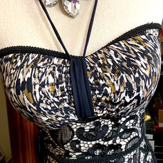 Swimsuit Top Only. Fabric Contents: 84% Nylon 13% Soandex Foam Lining: 100% Polyurethane Lining: 92% Nylon 8% Spandex Brand New Never Used Before, Tags Attached. This Listing Will Include One Swimsuit Top And Nothing Else Will Be Included With It. Ruched Tankini, Underwire Tankini, Badgley Mischka, Swimsuit Tops, Black Tan, Black Print, Womens Swim, Size 10, Spandex