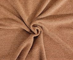 a close up view of a brown fabric