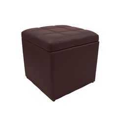 a large brown ottoman sitting on top of a white floor