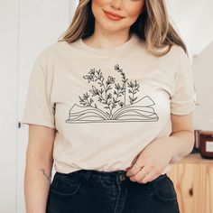 Bookish T-shirt With Funny Print And Short Sleeves, Bookish Graphic Print T-shirt For Summer, Summer Bookish T-shirt With Graphic Print, Bookish Short Sleeve Tops For Spring, Spring Bookish Short Sleeve Tops, Spring Bookish Style Short Sleeve T-shirt, Spring Bookish Short Sleeve T-shirt, Bookish Short Sleeve T-shirt For Spring, Spring Bookish T-shirt With Letter Print