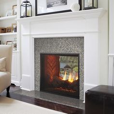 a living room with a fire place in it