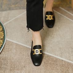 Looking for a versatile pair of shoes that can be dressed up or down? Check out our black loafer heels! These square-toed beauties are made of premium leather and feature gold metal hardware. They're the perfect shoes for any occasion. whether you're headed to the office or out on the town. Plus. they're so comfortable you'll want to wear them all day long. Don't miss out on this must-have style! Upper: Leather Lining: Leather Outsole: TPR Toe: Square Toe Closure: Slip on Heel: 5cm/2'' Color: Bl Elegant Workwear Loafers With Metal Pin Buckle, Classic Gold Loafers For Work, Elegant Gold Loafers For Spring, Chic Square Toe Platform Loafers, Chic Slip-on Loafers With Metal Feet, Chic Platform Loafers With Pointed Toe, Chic Loafers With Metal Pin Buckle For Work, Classic Gold Loafers For Office, Classic Gold Loafers With Metal Feet