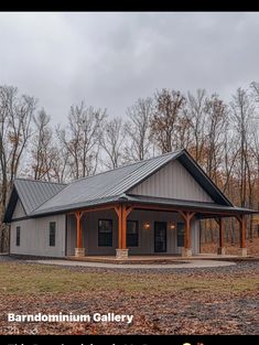 an image of a small building in the middle of some trees and leaves on the ground