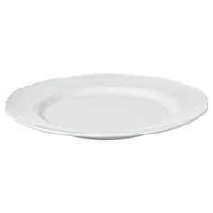 an empty white plate on a white background