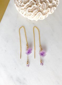 This Natural Raw Amethyst rough stones (10-12mm) threaders earrings in gold or sterling silver threaders. The pair also comes with a dangling tiny 4mm amethyst bead accent. Very pretty, unique and delicate statement earrings. 💜Simple, Dainty and Elegant Raw Natural Stone for everyday wear. I usually wear it with a matching necklace. Simple yet elegant especially the shine and color are so gorgeous.The picture does not do it justice it and is much prettier in person. Perfect for birthday, Christ Dainty Drop Earrings With Natural Stones, Delicate Drop Earrings With Natural Stones, Delicate Natural Stone Drop Earrings, Adjustable Hypoallergenic Dainty Threader Earrings, Dainty Adjustable Gemstone Earrings, Nickel-free 14k Gold Filled Threader Earrings As Gift, Handmade 14k Gold Filled Drop Threader Earrings, Dainty Adjustable Wire Wrapped Earrings, Adjustable Drop Earrings For Healing