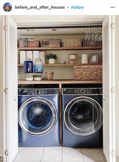 two washers and dryer in a small room with open shelving on the wall