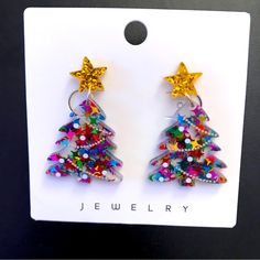 Christmas-Holiday Green Red Blue- Multi Color With Gold Star Top Tree Post Dangle Earrings! Sparkly, Fun Glittery Shiny Earrings! Perfect For The Holidays To Wear Or Give As A Gift! Lightweight. Nwot! Measurements Approximate: 1.75” Length 1” Width Smoke Free Home! Shiny Earrings, Star Tree, Star Top, Resin Earrings, Gold Star, Gold Stars, Red Blue, Red And Blue, Christmas Holidays