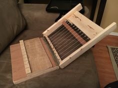 an old abacus sitting on top of a couch