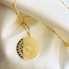 Very elegant Jewelry for women| , eye catching BIG circle necklace with stunning filigree, gold cut-out round geometric rosette medallion hanging on a  cute satelite  chain .  Available matching earrings and in sterling silver 925. ♡ DETAILS  Disc: 1.18"" (3 cm)  length   : 45 or 50 cm- 17.7" or 19.7" Material: 24k gold plated 925 Sterling Silver The jewelry is made entirely of 925 sterling silver or  24K gold plated  elements. Gold plated is a sterling silver 925 coated with 24K gold. The eleme Elegant Medallion Necklace For Anniversary, Elegant Medallion Necklace On Clavicle Chain, Elegant Medallion Necklace With Intricate Design, Elegant Round Pendant Medallion Necklace As Gift, Elegant Round Pendant Medallion Necklace For Gift, Elegant Gold-plated Medallion Necklace With Adjustable Chain, Elegant Gold Plated Medallion Necklace With Adjustable Chain, Elegant Round Pendant Coin Necklace, Elegant Jewelry With Delicate Chain And Medallion