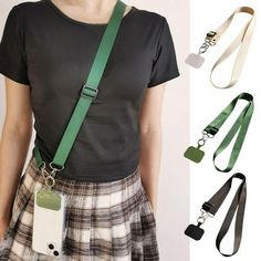 a woman wearing a plaid skirt and holding a cell phone in her hand with two lanyards attached to it