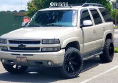 a white truck parked in a parking lot