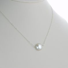 For my mom Simple Silver Jewelry With Pearl Chain, Simple Silver Necklace With Pearl Pendant, Simple White Pearl Drop Necklace, Simple Silver Jewelry With Pearl Charm, Simple Silver Pearl Drop Jewelry, White Round Pearl Necklace In Minimalist Style, Simple White Pearl Necklace As Gift, Minimalist Round Pearl Drop Necklace, Dainty Sterling Silver Pearl Necklace