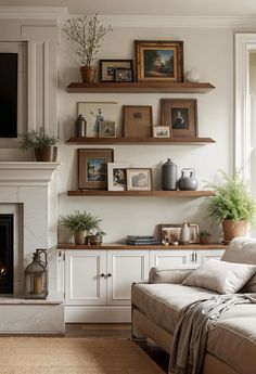 a living room filled with furniture and a fire place