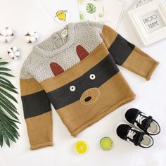 Keep kids cosy in style with this carton bear knitted sweater. Cut in a regular comfortable fit, with a round neck and ribbed cuffs to lock in warmth. Finished with an adorable cartoon bear pattern. Material: Cotton Cute Warm Cotton Sweater, Cute Brown Crew Neck Sweater, Cute Warm Knit Sweater, Playful Knitted Sweater For Fall, Playful Cotton Winter Sweater, Playful Cotton Sweater For Winter, Playful Crew Neck Sweater For Fall, Playful Crew Neck Fall Sweater, Cute Winter Sweater For Playtime