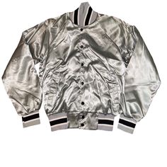 Vintage Win Wear Silver Grey Black Nylon Bomber Jacket Size Mens Small Size: Men’s Small Condition: 9/10 Been In Storage Looks Brand New No Tags. No Rips Or Stains. Just Wrinkly From Storages . Notes: Men’s Vintage Win Wear Silver Grey Nylon Satin Like Jacket . With Black And White Striped Cuffes. Has Pockets . Button Down Front . No Branding . Made In Usa. Measurements Top To Bottom- 25 Inches Pit To Pit- 19 Inches Arm Length-21 Inches Silver Winter Outerwear For Streetwear, Metallic Long Sleeve Outerwear For Streetwear, Sporty Silver Long Sleeve Outerwear, Casual Silver Winter Outerwear, Casual Silver Outerwear For Winter, Casual Silver Outerwear For Fall, Silver Casual Spring Outerwear, Black Nylon, Black Nylons